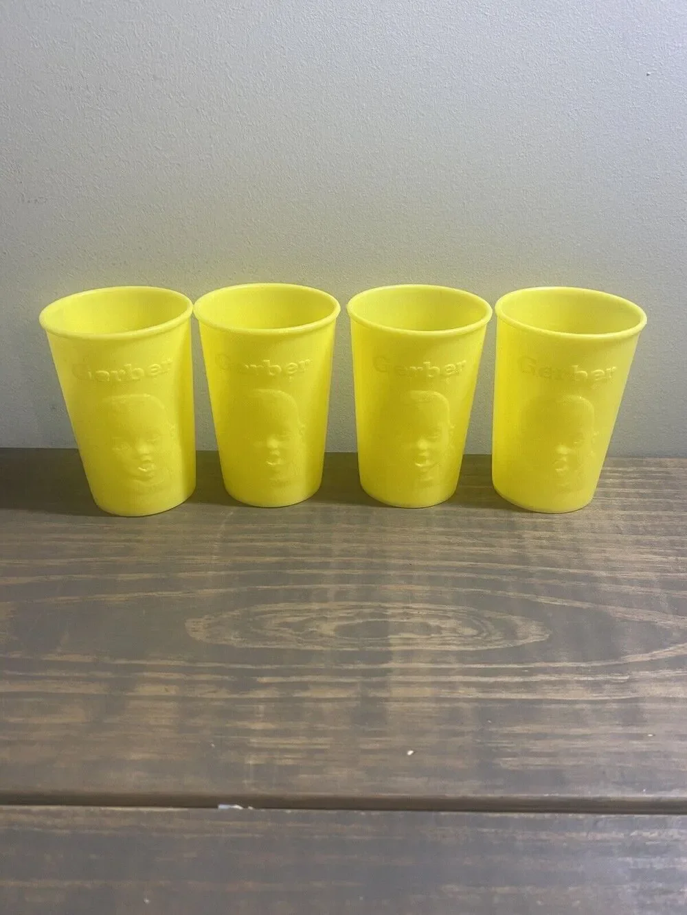 YELLOW Gerber Products Baby Face CUPS Plastic USA 1950s-1960s set of 4 vtge